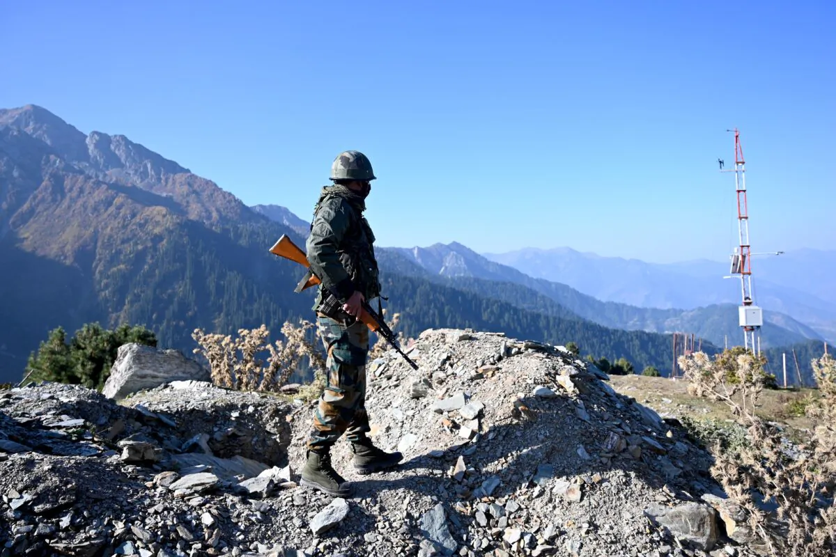 An Indian Army soldier stands guard near Nastachun pass, also known as Sadhana pass, about 5 miles from the Line of Control (LOC) in the district of Kupwara, on Oct. 14, 2020. (Money Sharma/AFP via Getty Images)