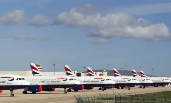 BA Parent Company Books Huge Loss, Pushes for Digital Passes