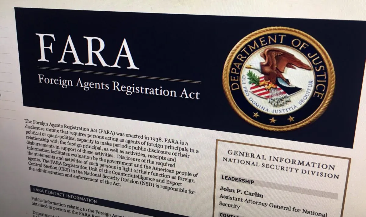 A portion of the website for the U.S.’s Foreign Agents Registration Act in Washington in a file photo. (AP Photo/Jon Elswick, File)