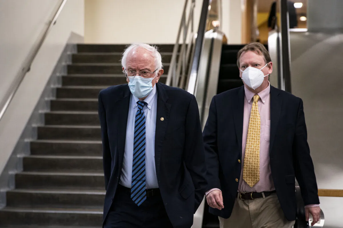 Sen. Bernie Sanders (I-Vt.) departs following a vote in the subway of the U.S. Capitol in Washington on Feb. 23, 2021. (Al Drago/Getty Images)