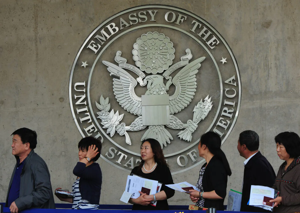 Chinese citizens wait to submit their visa applications at the US Embassy in Beijing on May 2, 2012. (Mark Ralston/AFP/GettyImages)