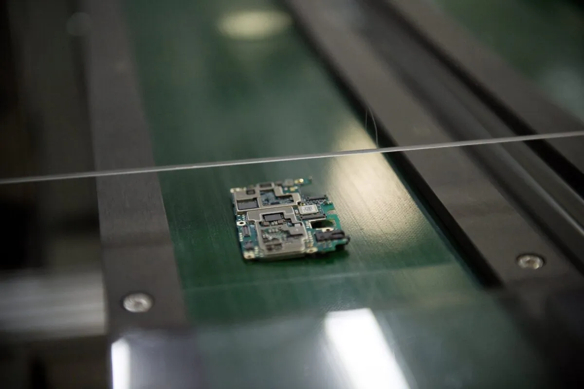 A smartphone chip component circuit is seen at the Oppo factory in Dongguan on May 8, 2017. (Nicolas Asfouri/AFP via Getty Images)