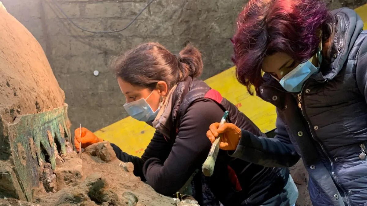 Archeologists uncover an ancient ceremonial carriage in a dig near the ancient Roman city of Pompeii, destroyed in 79 AD in a volcanic eruption, in Italy on Feb. 2021. (Luigi Spina, Pompeii Archeological Park/Ministry of Cultural Heritage and Activities and Tourism, Handout via Reuters)