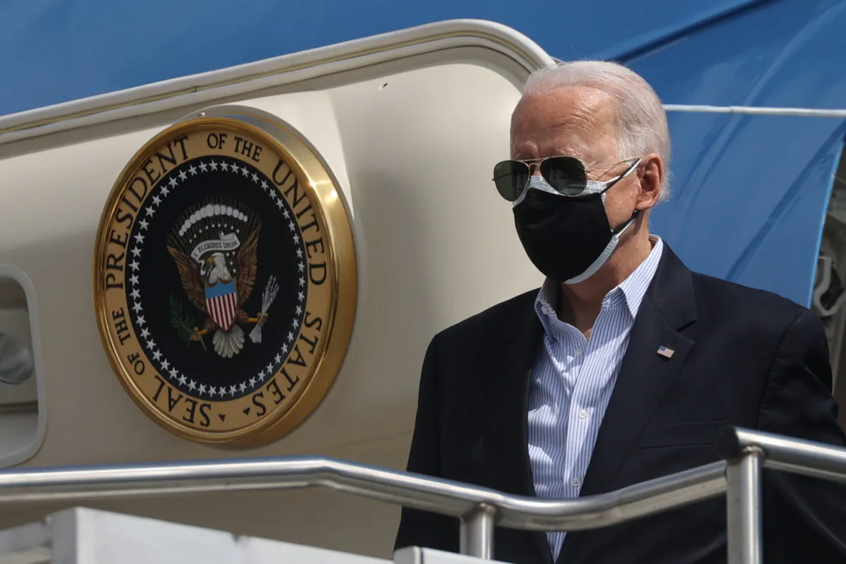 President Joe Biden arrives at Ellington Field Joint Reserve Base in Houston, Texas, on Feb. 26, 2021. (Jonathan Ernst/Reuters)