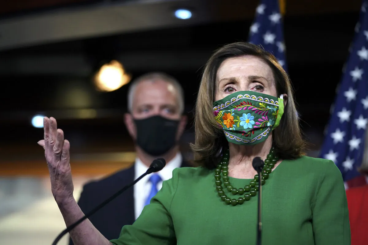 House Speaker Nancy Pelosi (D-Calif.) speaks during a news conference about COVID-19 relief legislation in Washington, on Feb. 26, 2021. (Drew Angerer/Getty Images)