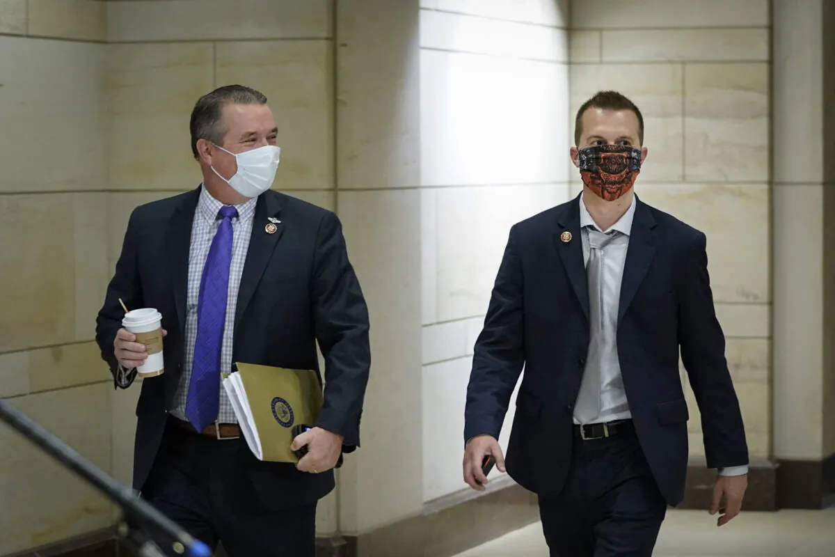 Rep. Jared Golden (D-Maine), left, is seen walking with Rep. Don Bacon (R-Neb.) in Washington on May 28, 2020. (Drew Angerer/Getty Images)
