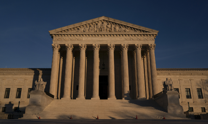 The Supreme Court stands on December 11, 2020 in Washington. (Stefani Reynolds/Getty Images)