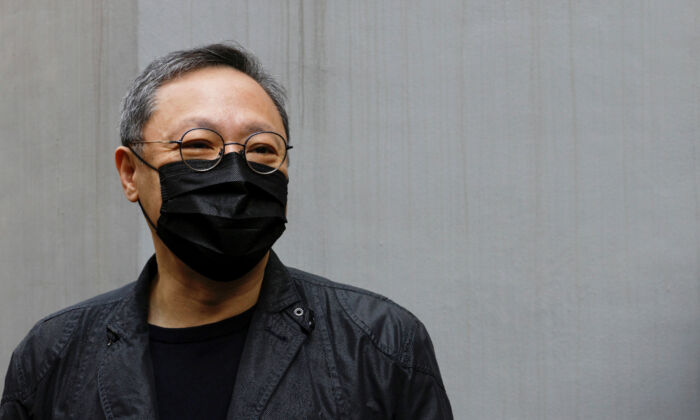 Pro-democracy activist Benny Tai, among the 47 arrested, arrives to report to the police station over the national security law charges in Hong Kong on Feb. 28, 2021. (Tyrone Siu/Reuters)