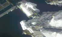 Spacewalking Astronauts Prep Station for New Solar Wings