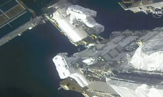 Spacewalking Astronauts Prep Station for New Solar Wings