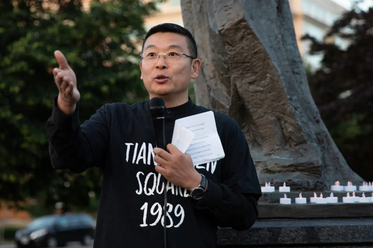 Human rights activist Yang Jianli speaks at a candlelight vigil to commemorate the 29th Anniversary of the June 4th Tiananmen Square Massacre at the Victims of Communism Memorial in Washington on June 4, 2018. (Samira Bouaou/The Epoch Times)