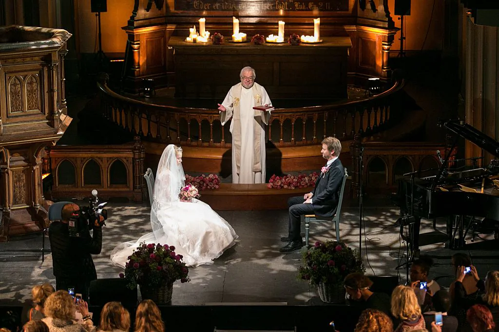 A mock wedding between a 12-year-old child bride and her 37-year-old fiance is staged in Oslo on October 11, 2014. The wedding was part of a campaign against child marriage. (Audun Braastad/AFP via Getty Images)