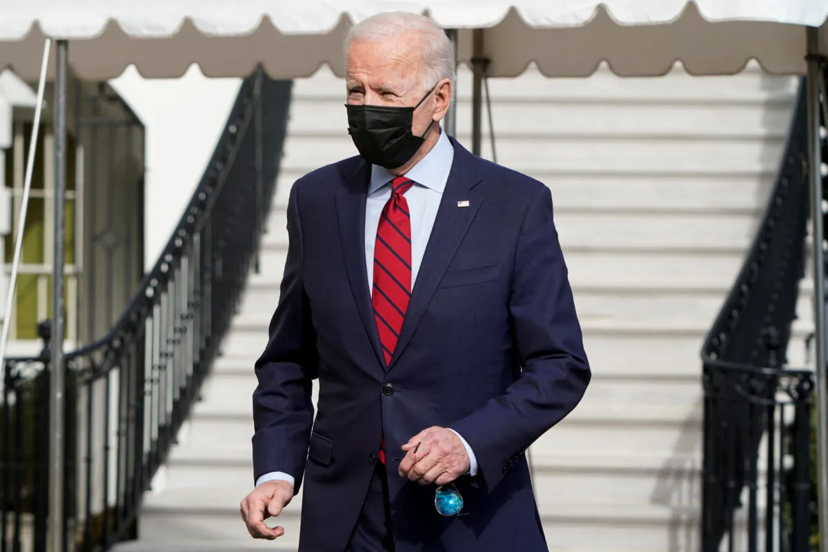 President Joe Biden speaks to the media as he departs for Wilmington, Delaware, from White House in Washington, on Feb. 27, 2021. (Joshua Roberts/Reuters)