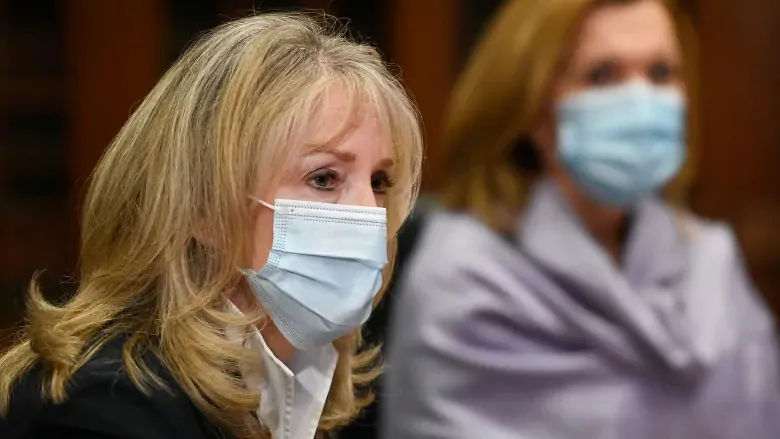Merrilee Fullerton, Ontario's Minister of Long-Term Care listens to updates regarding the Ontario COVID-19 vaccine during the COVID-19 pandemic in Toronto on January 5, 2021. (Nathan Denette/The Canadian Press)