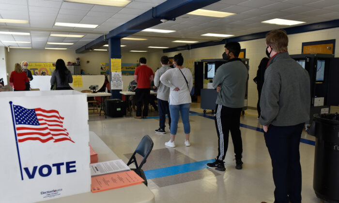 Voters go to the polls at Sara Smith Elementary polling station, in the Buckhead district, in Atlanta during the Georgia Senate runoff elections, on Jan. 5, 2021. (Virginie Kippelen/AFP via Getty Images)