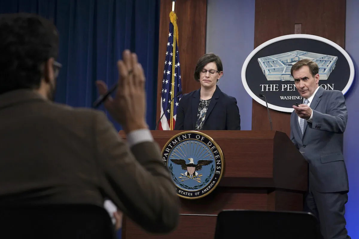 Stephanie Miller, head of accession policy at the Pentagon (C) and Pentagon spokesman John Kirby (R) speak during a briefing at the Pentagon in Washington on March 31, 2021. (Susan Walsh/AP Photo)