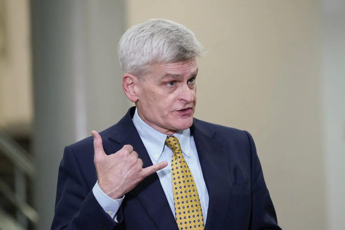 Sen. Bill Cassidy (R-La.) talks with reporters on Capitol Hill in Washington on Feb. 12, 2021. (Susan Walsh/AP Photo)