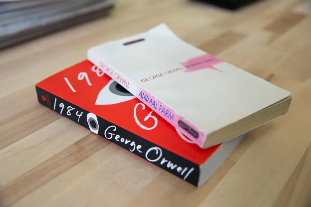 A copy of George Orwell’s novel “1984” and "Animal Farm" sit on a table in New York on Feb. 26, 2021. (Chung I Ho/The Epoch Times)