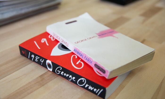 A copy of George Orwell’s novel “1984” and "Animal Farm" sit on a table in New York on Feb. 26, 2021. (Chung I Ho/The Epoch Times)