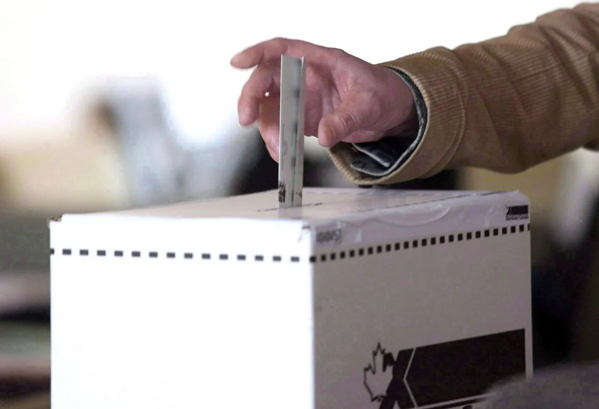 A voter casts a ballot in the 2011 federal election in Toronto, Canada, on May 2, 2011. (Chris Young/The Canadian Press)