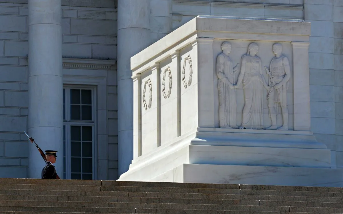 A Tomb Guard or Sentinel from the U.S. Army 3rd Infantry Regiment, also called "The Old Guard," marches in front of the Tomb of the Unknown Soldier in Arlington Cemetery in Arlington, Va., on April 22, 2020. (Chip Somodevilla/Getty Images)