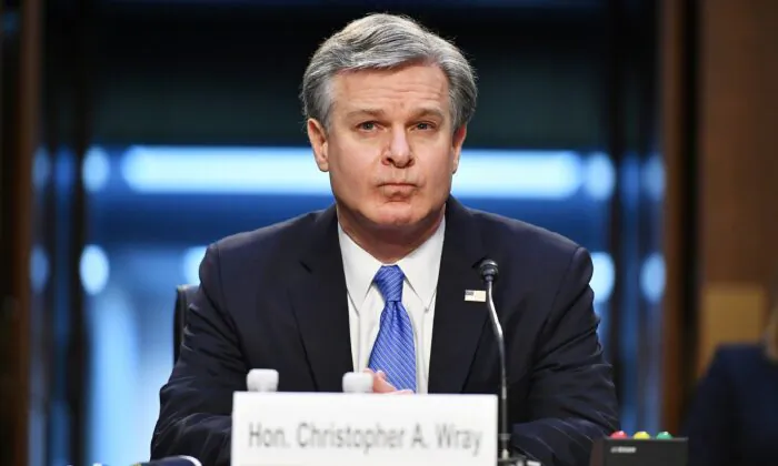 FBI Director Christopher Wray arrives to testify before the U.S. Senate Judiciary Committee on Capitol Hill in Washington on March 2, 2021. (Mandel Ngan/Pool via Reuters)