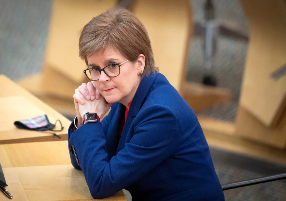 Scotland's First Minister Nicola Sturgeon, attends a COVID-19 briefing at the Scottish Parliament in Holyrood, Edinburgh, Scotland Britain, on March 2, 2021. (Jane Barlow/PA Wire/Pool via Reuters)