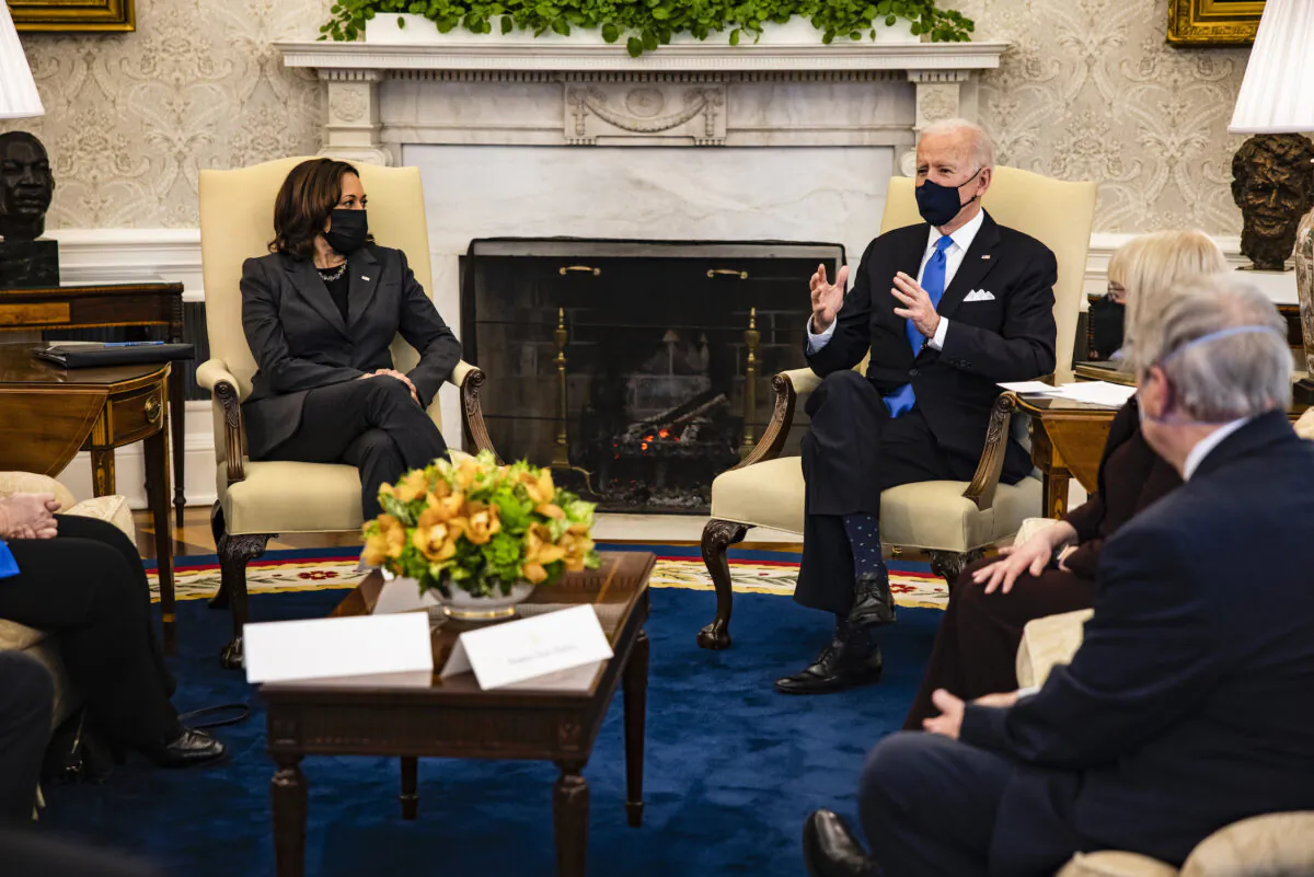 President Joe Biden holds a meeting on cancer with Vice President Kamala Harris and other lawmakers in the Oval Office at the White House on March 3, 2021. (Samuel Corum/Getty Images)