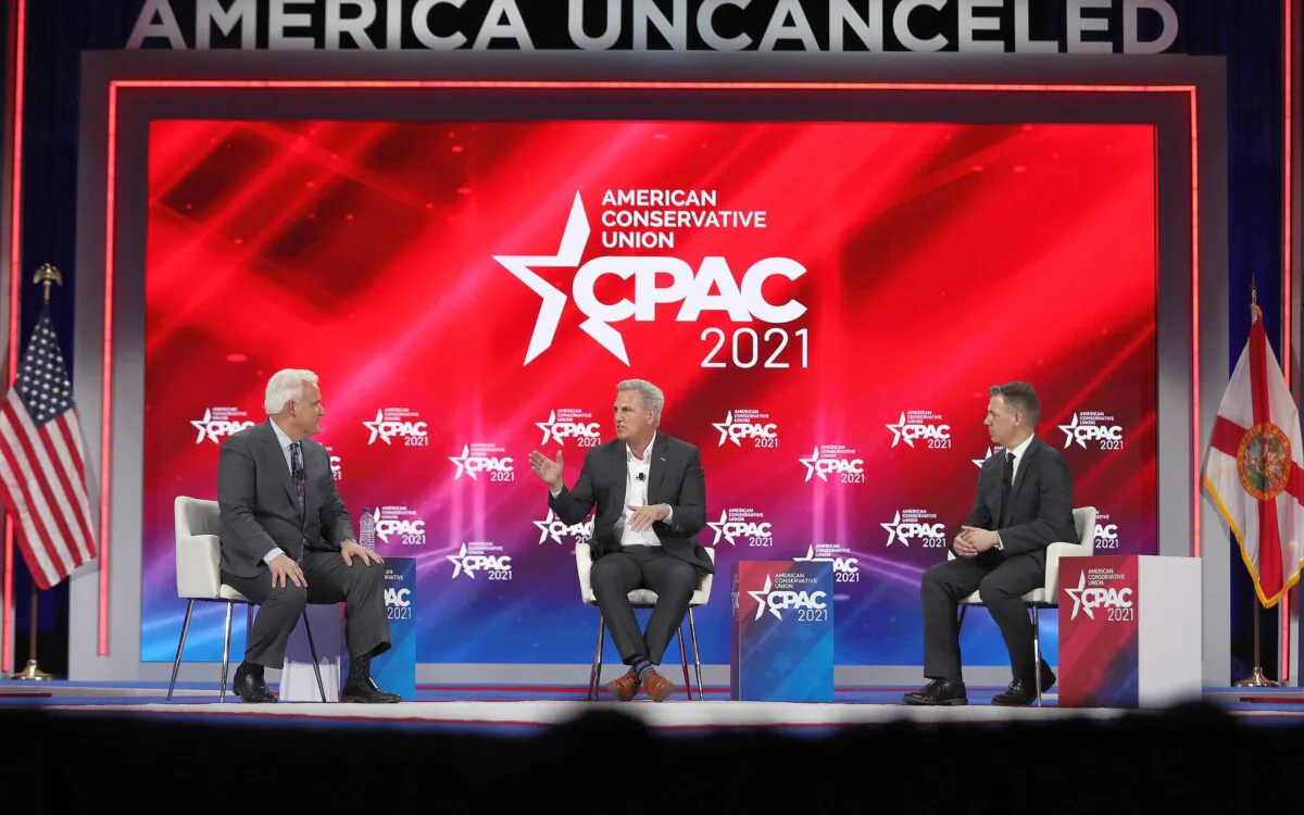 (L-R) Matt Schlapp, Moderator, American Conservative Union chairman, Rep. Kevin McCarthy (R-Calif.), House Minority Leader, and Rep. Jim Banks (R-Ind.), participate in a discussion titled 'Winning Back America' during the Conservative Political Action Conference (CPAC) held in the Hyatt Regency in Orlando, Fla., on Feb. 27, 2021. (Joe Raedle/Getty Images)
