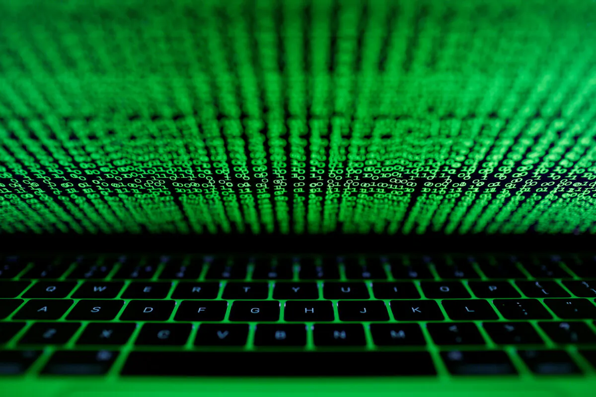 A computer keyboard lit by a displayed cyber code is seen in this illustration picture taken on March 1,  2017. (Kacper Pempel/Illustration/File/Reuters)