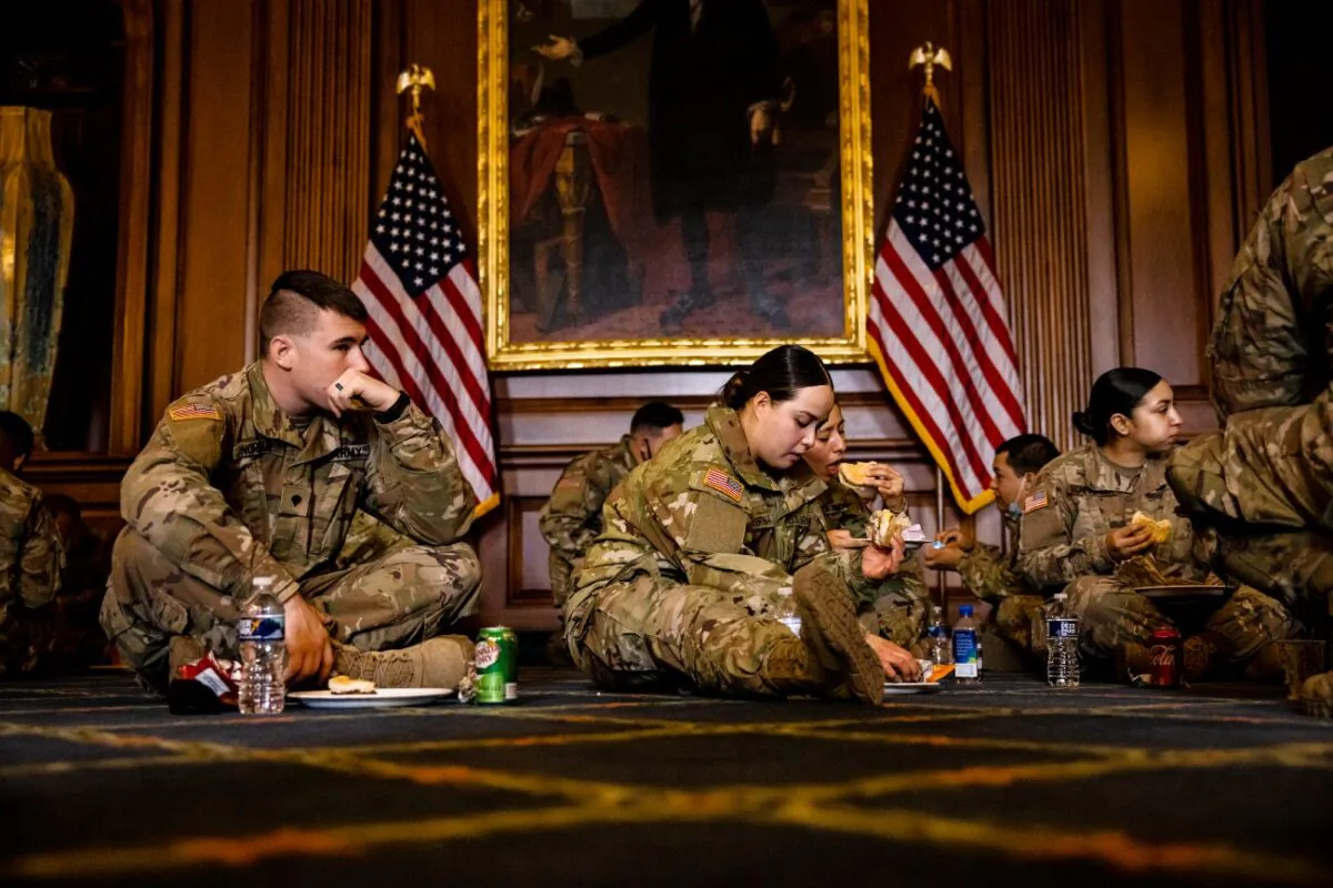 California National Guard troops enjoy breakfast that was provided by House Minority Leader Kevin McCarthy (R-Calif.) as a show of gratitude in the Rayburn Room at the U.S. Capitol in Washington, on Feb. 12, 2021. (Samuel Corum/Getty Images)