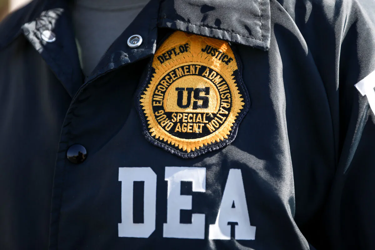 A Drug Enforcement Administration agent in Denver, Colo., on Oct. 1, 2020. (Charlotte Cuthbertson/The Epoch Times)