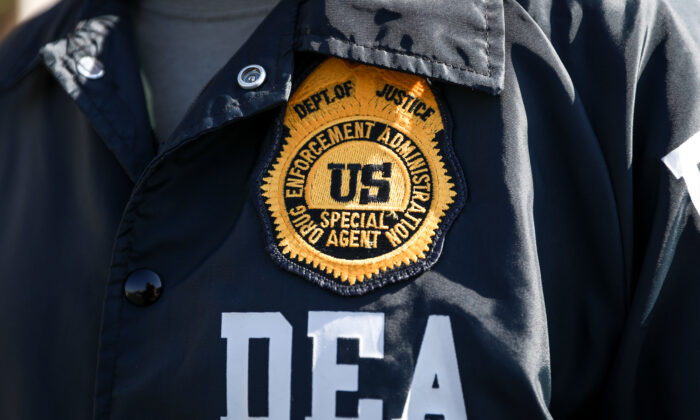 A Drug Enforcement Administration agent in Denver, Colo., on Oct. 1, 2020. (Charlotte Cuthbertson/The Epoch Times)
