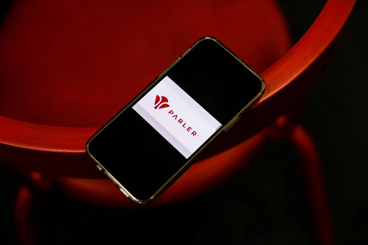 The Parler social media website is displayed on a cell phone in New York City on March 5, 2021. (Samira Bouaou/The Epoch Times)