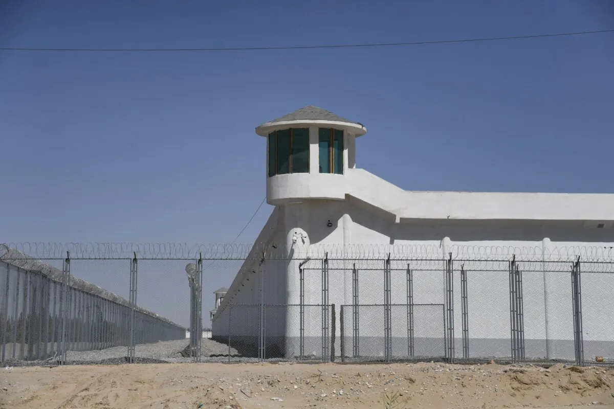 This photo taken on May 31, 2019 shows a watchtower on a high-security facility near what is believed to be a re-education camp where mostly Muslim ethnic minorities are detained, on the outskirts of Hotan, in China's northwestern Xinjiang region. (Greg Baker/AFP via Getty Images)
