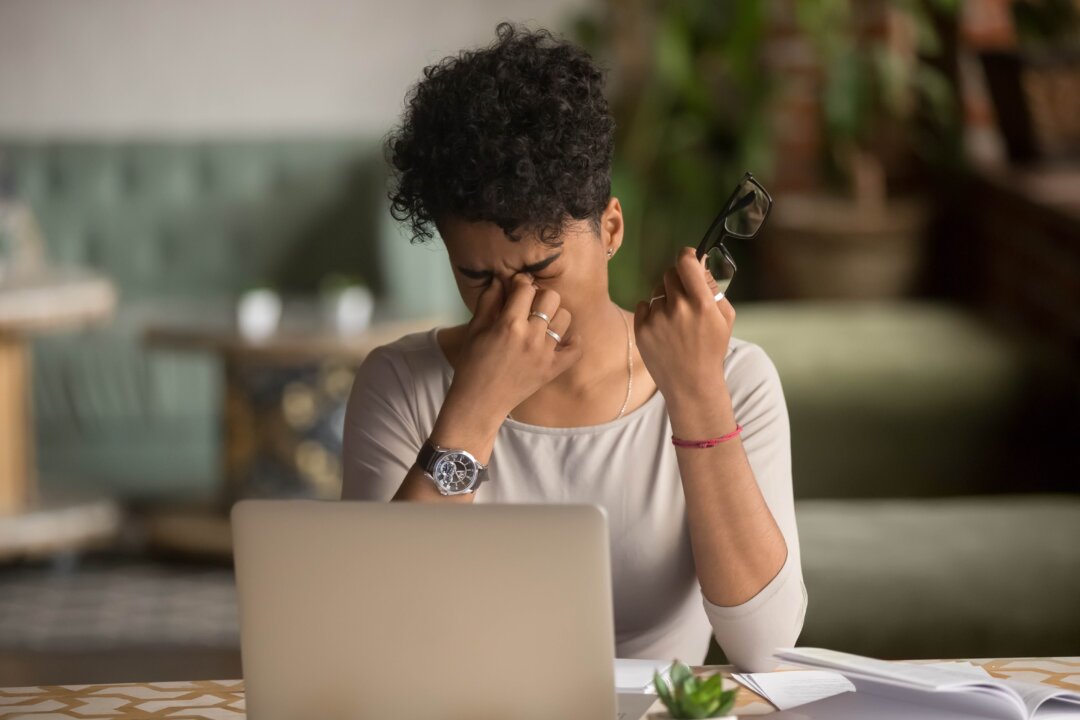 Screens can be hard on our eyes but you can get some protection by using computer
glasses that block blue light, cut the glare, and increase visual contrast.(fizkes/Shutterstock)