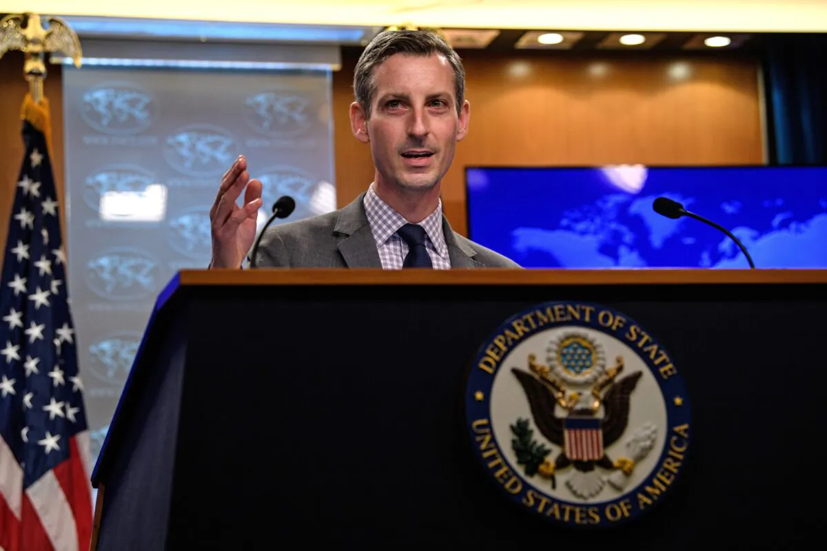 State Department spokesman Ned Price gestures as he speaks during the daily press briefing at the State Department in Washington, DC, U.S. Feb. 25, 2021. (Nicholas Kamm/Pool via REUTERS)
