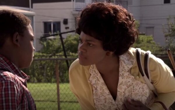 black boy being reprimanded by mother