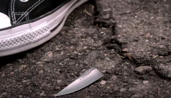 tennis shoe and knife blade