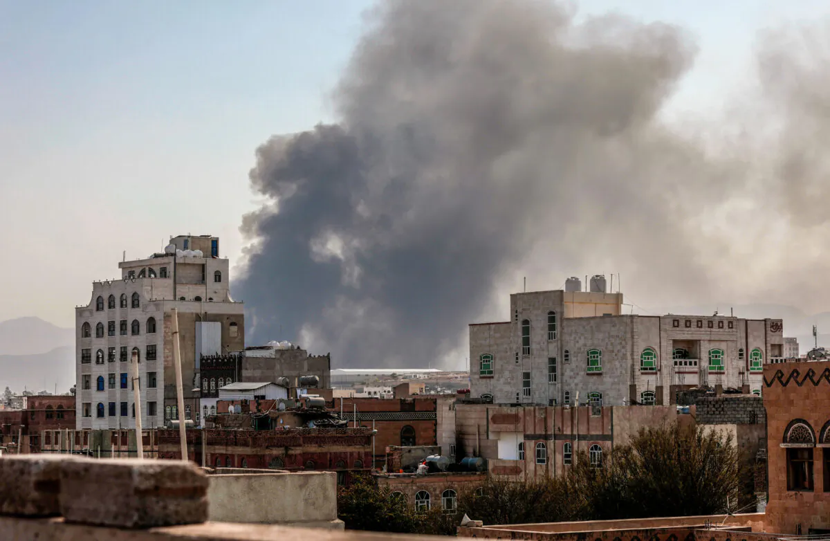 Smoke rises after Saudi-led airstrikes on an army base in Sanaa, Yemen, Sunday, Mar. 7, 2021. (AP Photo/Hani Mohammed)