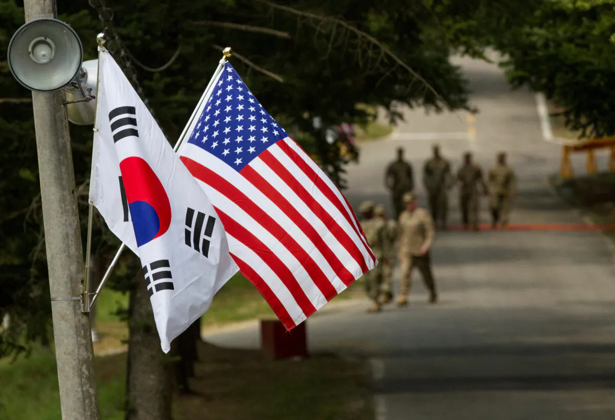 The South Korean and American flags fly next to each other at Yongin, South Korea, on Aug. 23, 2016. (Ken Scar/U.S. Army/Handout via Reuters)