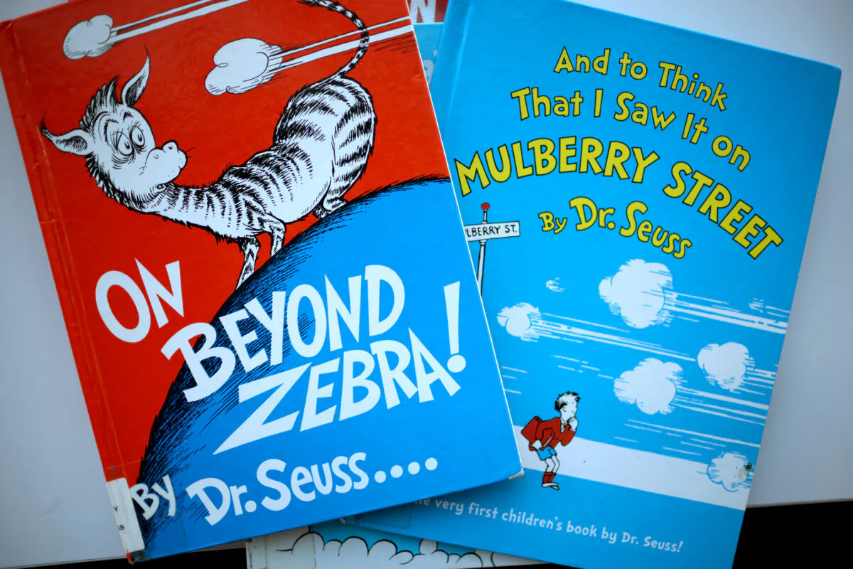 Two of six titles by Theodor Seuss Geisel, aka Dr. Seuss—"On Beyond Zebra!" and "And to Think That I Saw it on Mulberry Street"—that will no longer be printed because they are considered politically incorrect, at the Chinatown Branch of the Chicago Public Library in Chicago, on March 2, 2021. (Scott Olson/Getty Images)