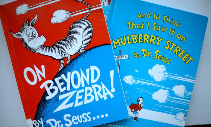 Two of six titles by Theodor Seuss Geisel, aka Dr. Seuss—"On Beyond Zebra!" and "And to Think That I Saw it on Mulberry Street"—that will no longer be printed because they are considered politically incorrect, at the Chinatown Branch of the Chicago Public Library in Chicago, on March 2, 2021. (Scott Olson/Getty Images)