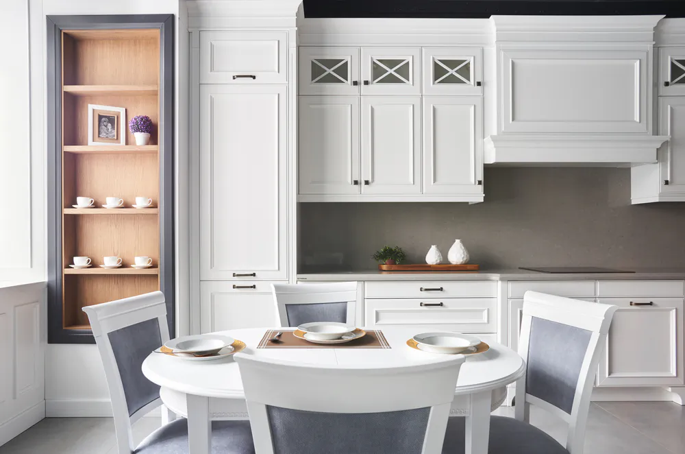 Wood cabinets are prone to all sorts of grease, grime, and gunk from simply being in the kitchen.(Iglenas/Shutterstock)