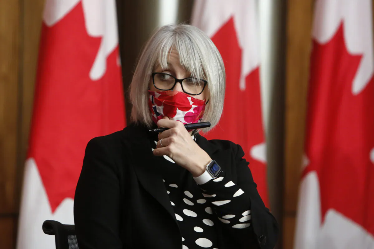 Health Minister Patty Hajdu arrives at a COVID-19 press conference in Ottawa, Canada, on Dec. 11, 2020. (David Kawai/The Canadian Press)