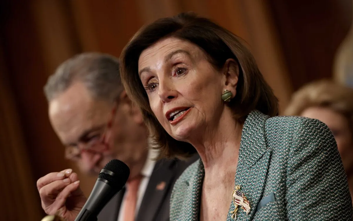 (R) House Speaker Nancy Pelosi (D-Calif.) and then-Senate Minority Leader Chuck Schumer (L) (D-N.Y.) speak at a press conference marking the one-year anniversary of the House passing H.R. 1, the "For the People Act," in Washington on March 10, 2020. (Win McNamee/Getty Images)