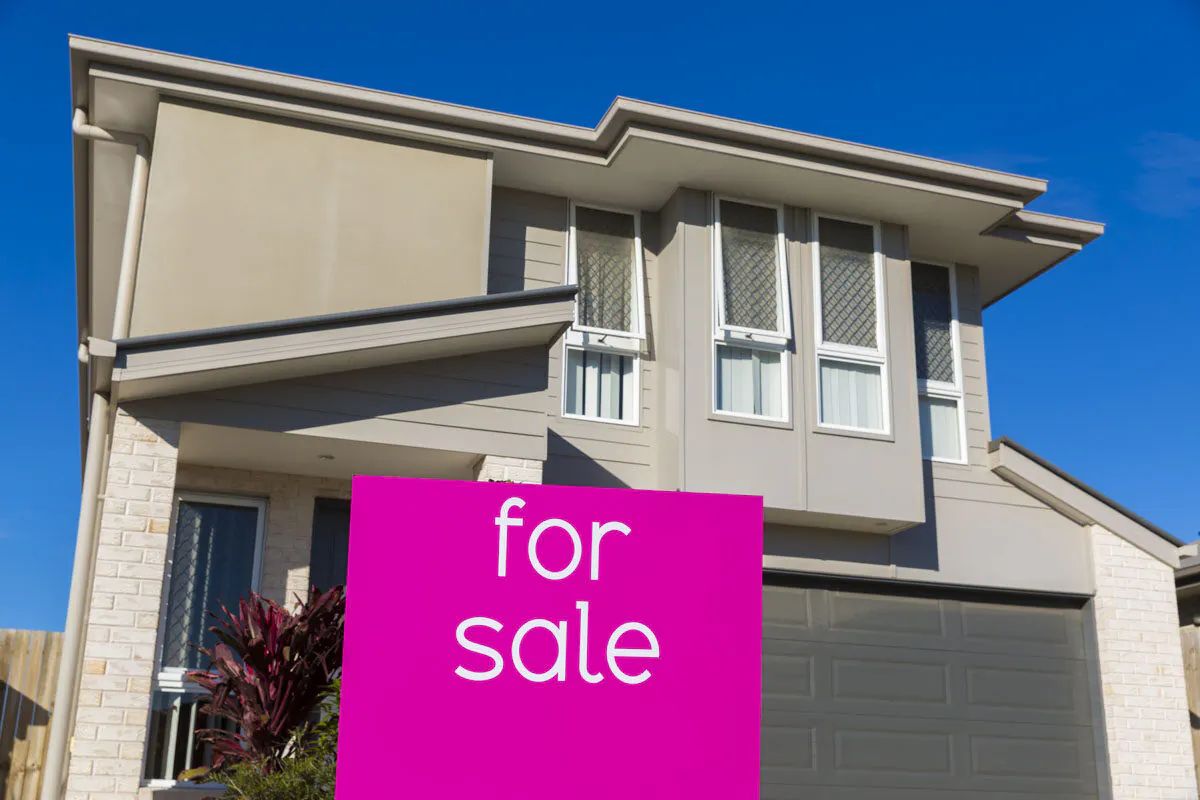 Property sales signage is displayed in North Lakes on June 10, 2016 in Brisbane, Australia. (Glenn Hunt/Getty Images)
