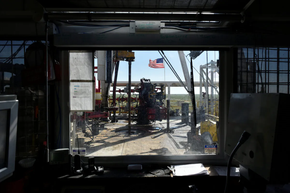 The operations floor of a drilling rig is seen from the control room on a lease owned by Oasis Petroleum in the Permian Basin near Wink, Texas on Aug. 22, 2018. (Nick Oxford/Reuters)
