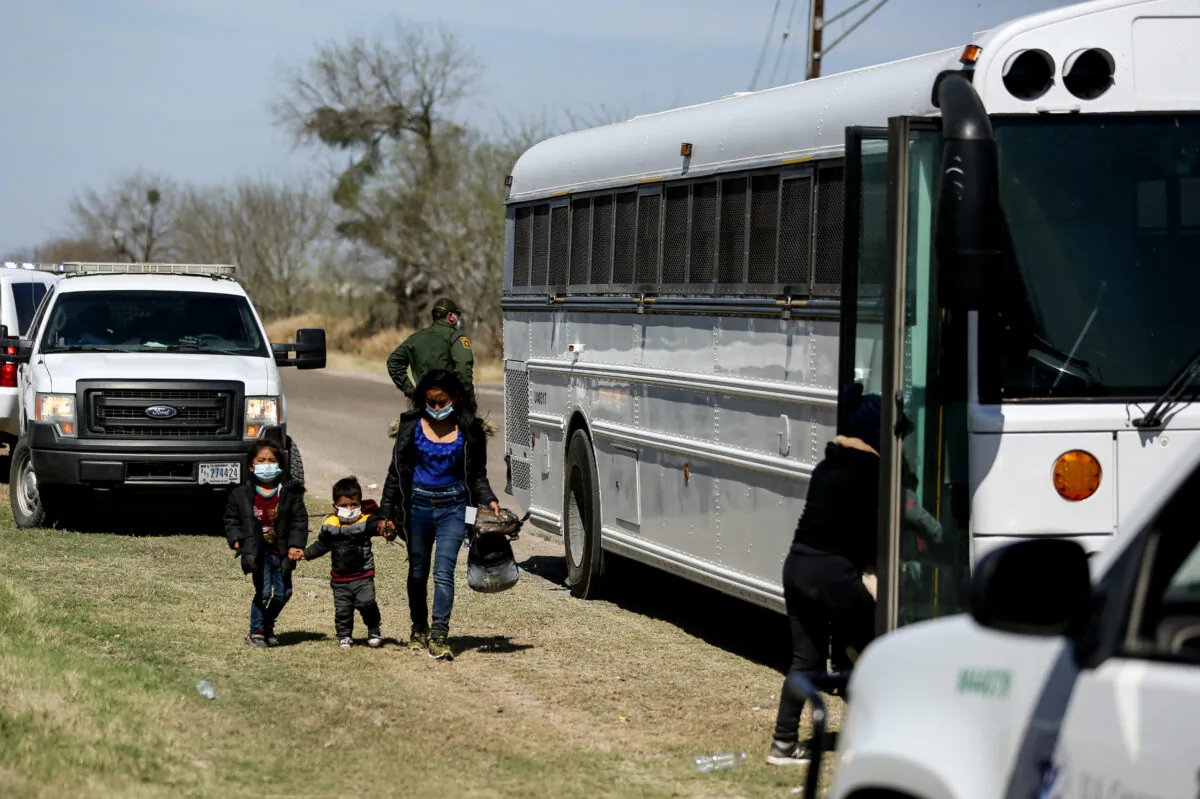 Border Patrol agents apprehend a busload of illegal immigrants in Penitas, Texas, on March 10. 2021. (Charlotte Cuthbertson/The Epoch Times)