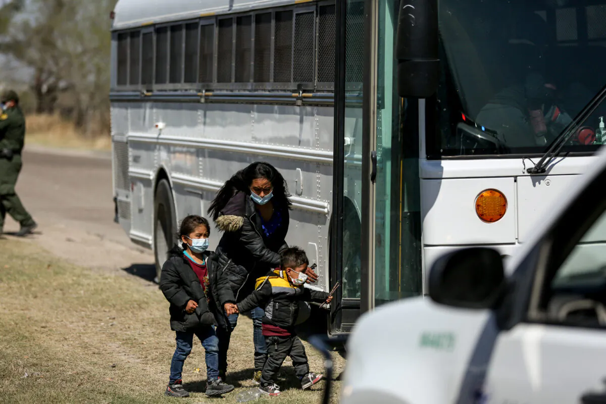 Border Patrol agents apprehend a busload of illegal immigrants in Penitas, Texas, on March 10, 2021. (Charlotte Cuthbertson/The Epoch Times)